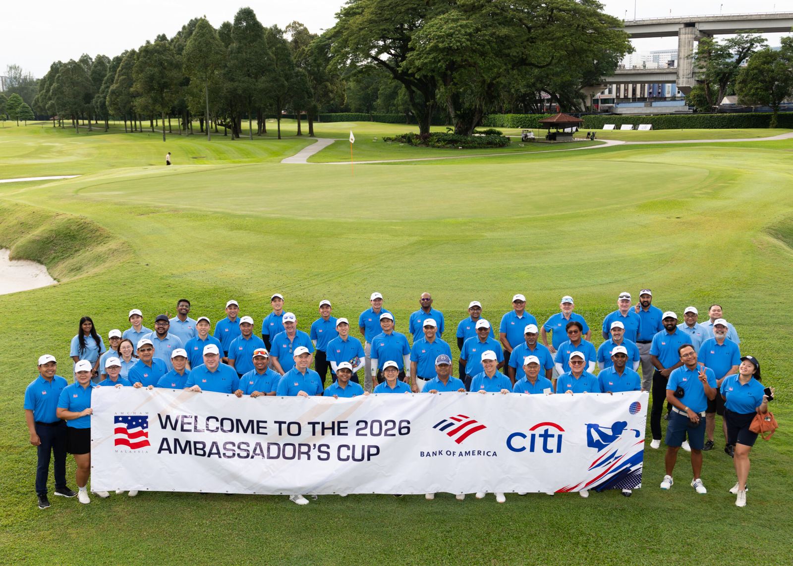 Players and hosts on the course at the AMCHAM 2026 Ambassador’s Cup