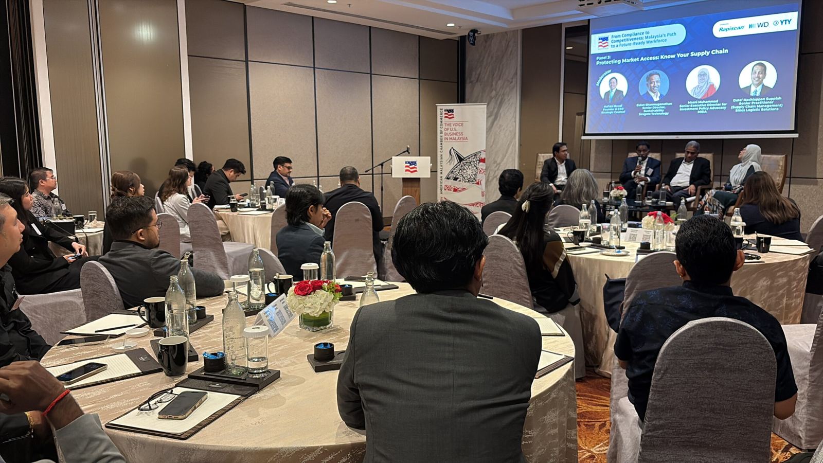 The room at From Compliance to Competitiveness