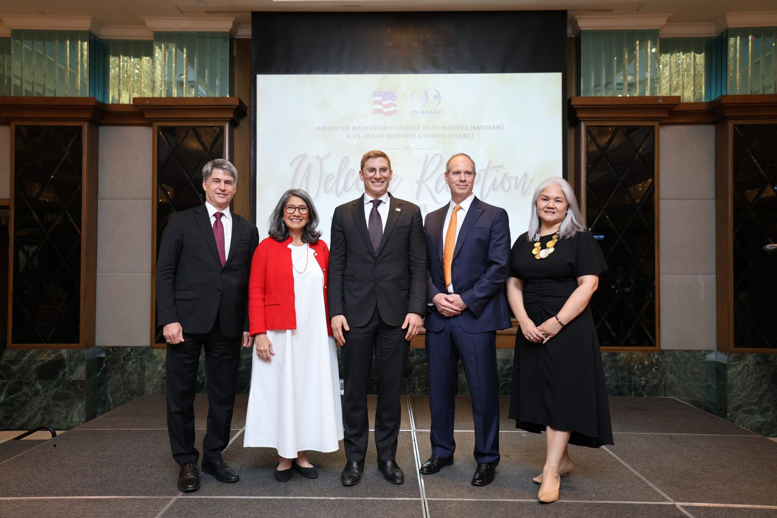 Hosts at the Welcome Reception for the U.S. Presidential Delegation